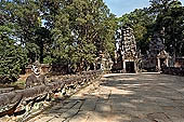 Preah Khan temple - west entrance of the fourth enclosure, the bridge lined by devas and asuras.